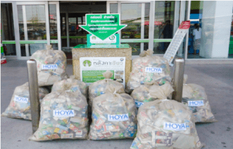 Collection of paper cartons to be recycled into roofing materials